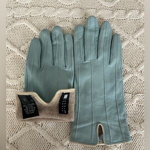 Gloved-Elegant robins egg blue gloves with cream trim 
Carol Little size M
